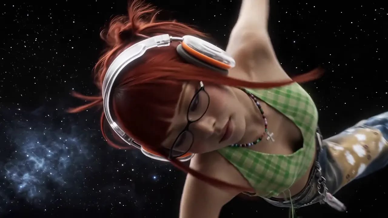 A red-haired woman in headphones and a green top floats among the stars and drifts away from the camera.